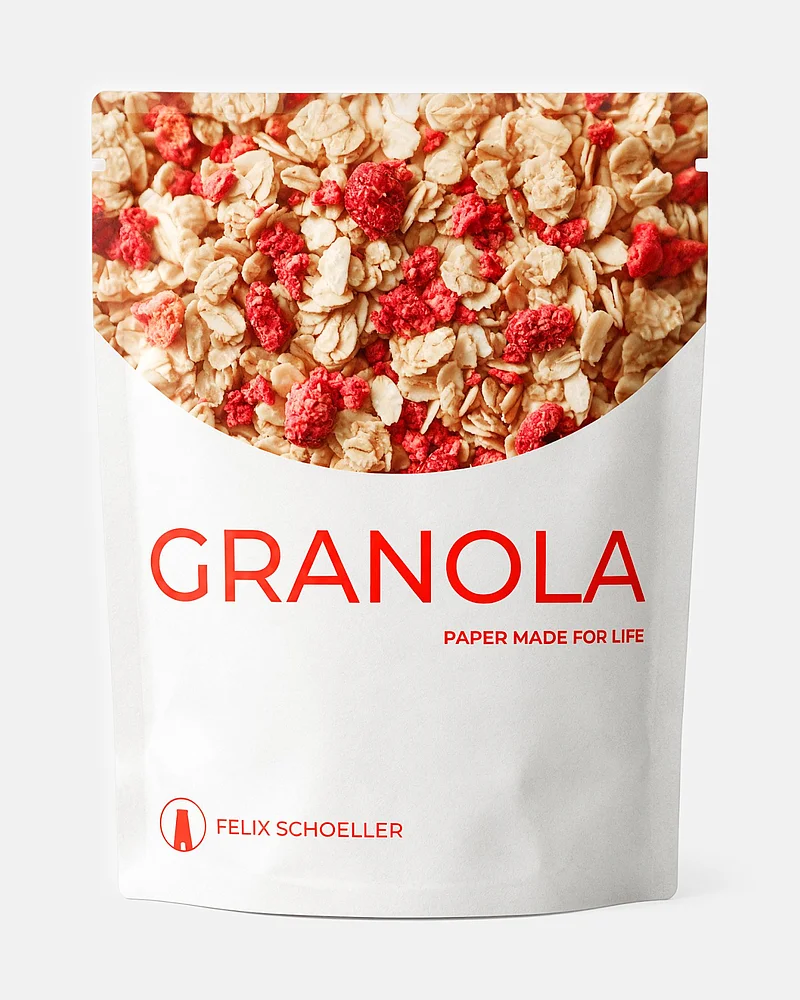 Weiße Papierverpackung „Granola“ von Felix Schoeller  und Müsli mit roten Fruchtstücken